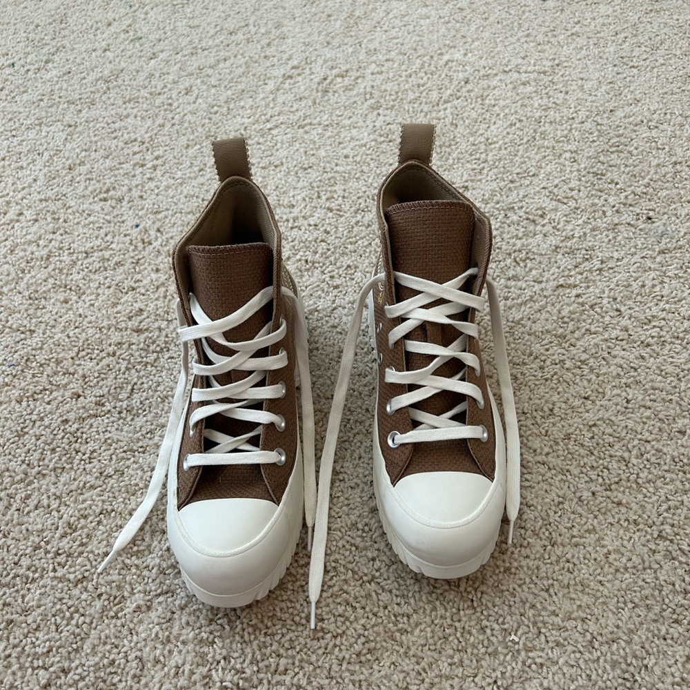Brown high top converse women’s 6.5. Brand new, never worn.